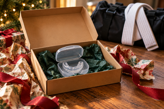A mouthguard case inside an open Christmas gift box, the wrong gift